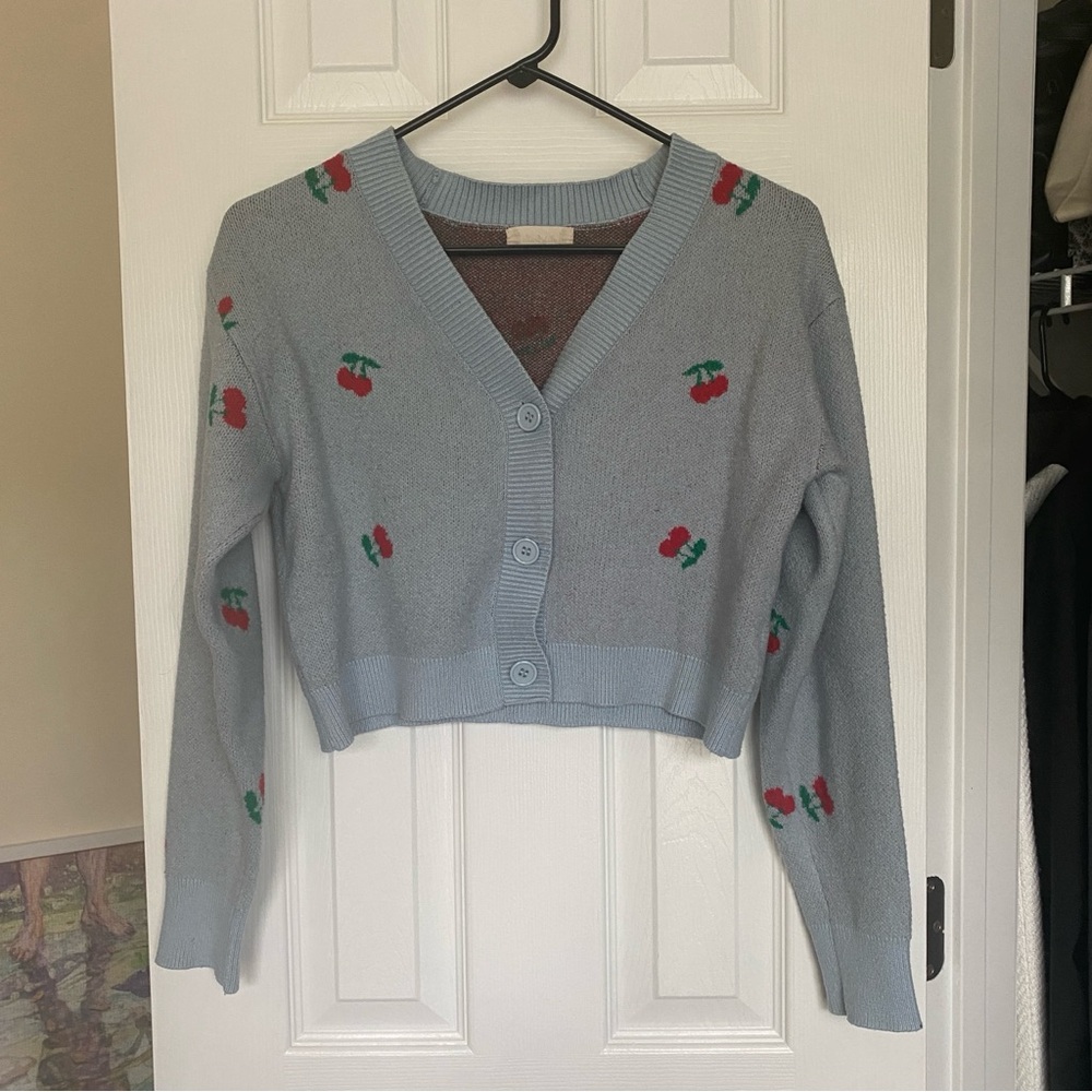 Altar’d State Cherry Print Baby Blue Cardigan Sweater
Size Small